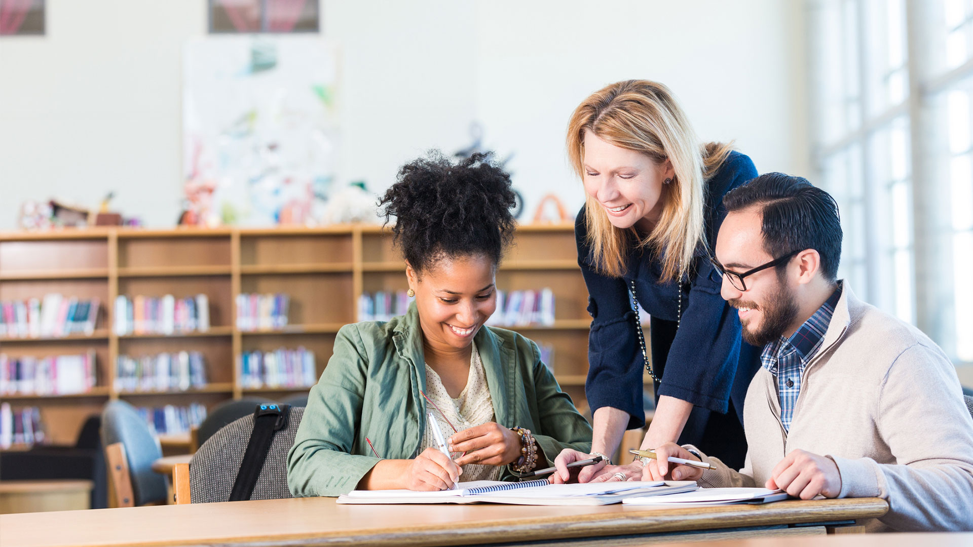 Professor helping students